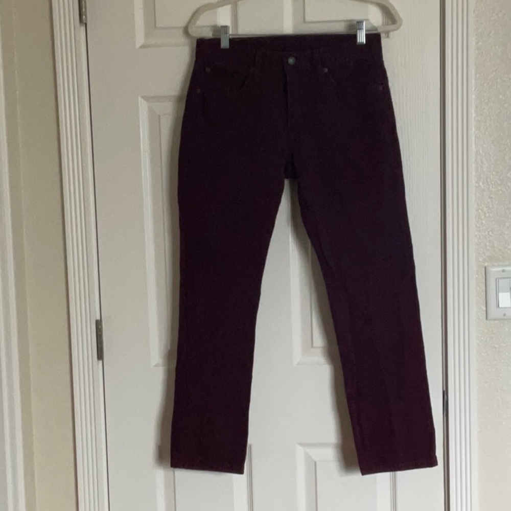 Women’s Levi’s 502 denim pants. Dark plum/purple in color, 30x30.